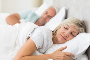 Older couple sleeping